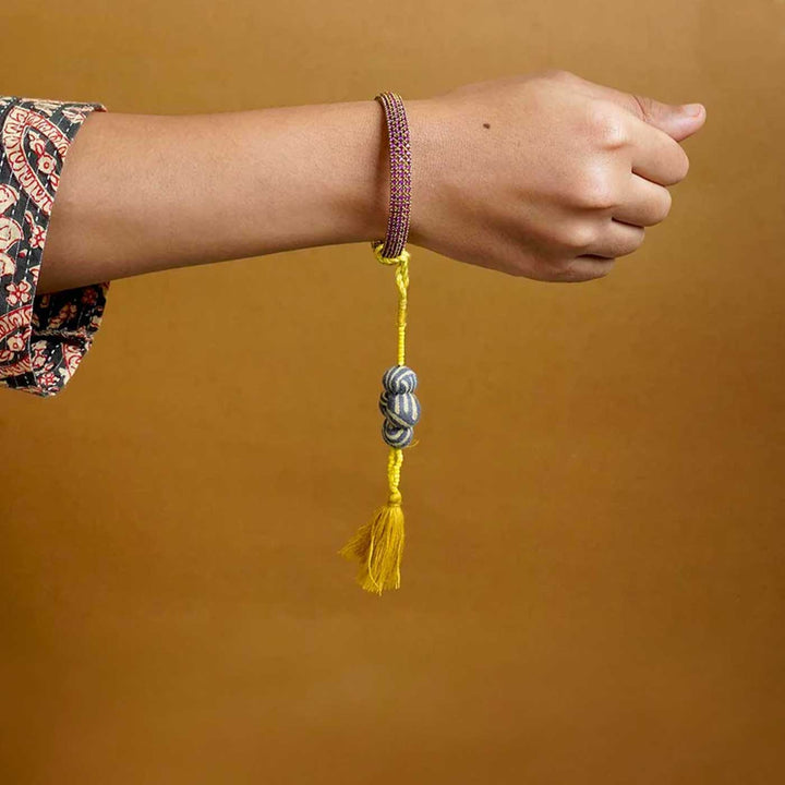 Handmade Swarnamukhi Potli Upcycled Fabric Lumba Rakhi For Bhabhi With Roli Chawal