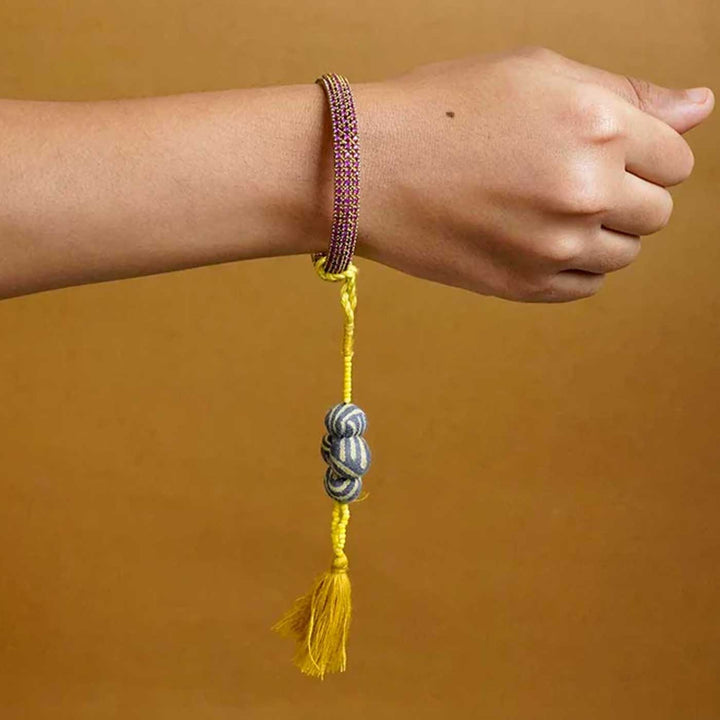 Handmade Swarnamukhi Potli Upcycled Fabric Lumba Rakhi For Bhabhi With Roli Chawal