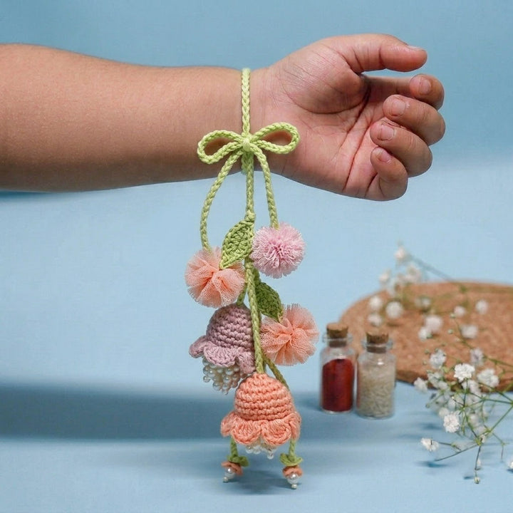 Handmade Crochet Forever Flowers Kids Lumba Rakhi With Roli Chawal