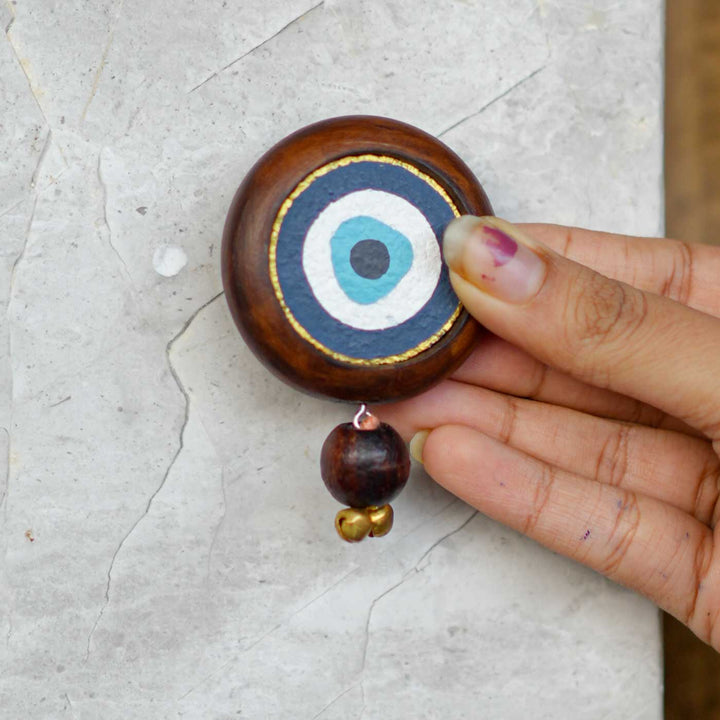 Handmade Divya Drishti Gift Hamper | Includes Evil Eye Door Hanging, Evil Eye Coasters, Evil Eye Candle Stand, Evil Eye Bell Hangings, Seed Card And Outer Box