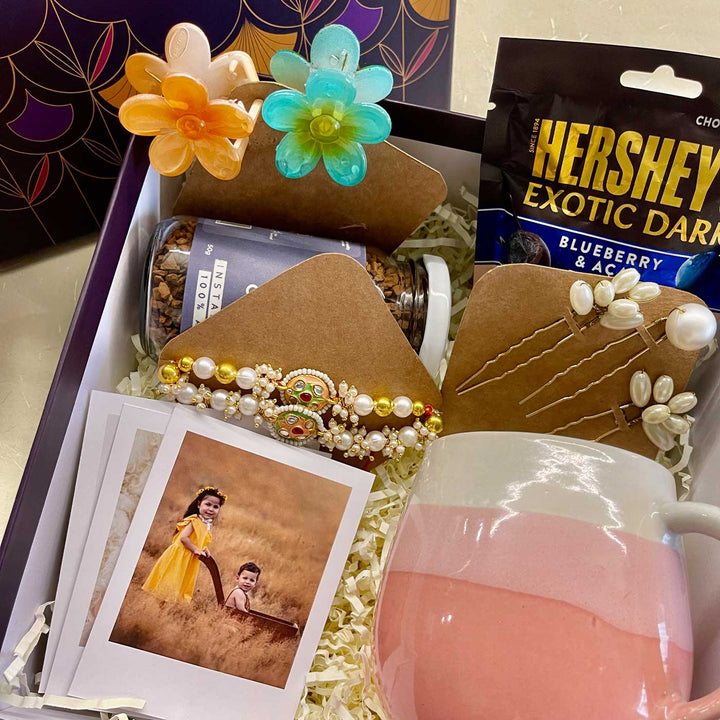 Photo Personalized Handmade Threads And Treasures Rakhi Hamper | Includes 1 Mug, 2 Clips, 5 Photos, 3 Hair Pin, 1 Marble Lotus, 1 Chocolate, 1 Coffee & 1 Set Rakhi