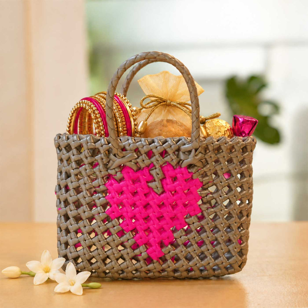 Handwoven Grey Small Plastic Wire Koodai Bag With Pink Heart Motif For Festive Return Gifts