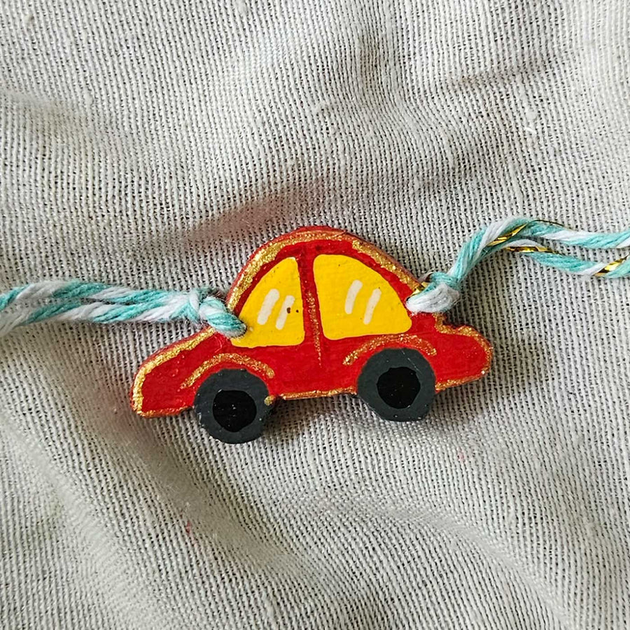 Handpainted Quirky Wooden Rakhi With Roli Chawal 2 New - Close-up Front View