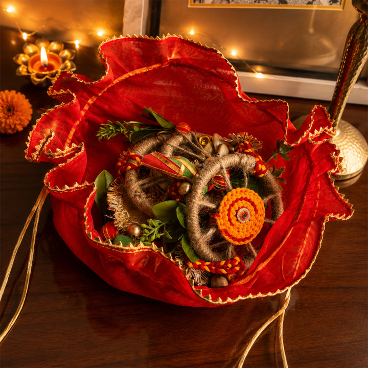 Utsav Jute Net Basket Diwali Gift Hamper With Red Toran Potli And Matka Soy Wax Candle For Festive Gifting