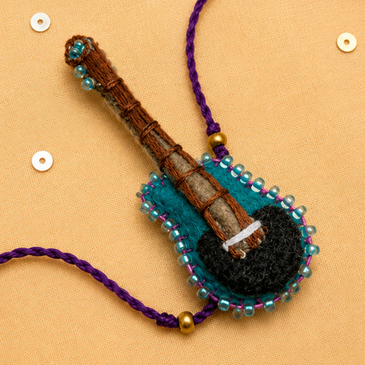 Hand Embroidered Guitar Rakhi With Keychain For Brother