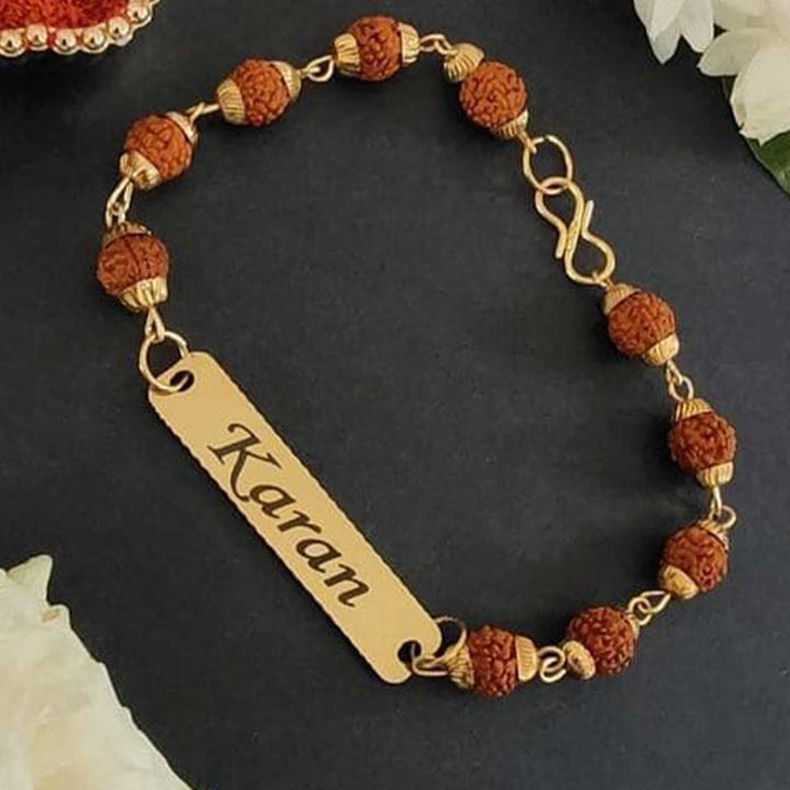 Personalized Handmade Religious Rudraksh Bracelet Rakhi - Front View on Dark Background