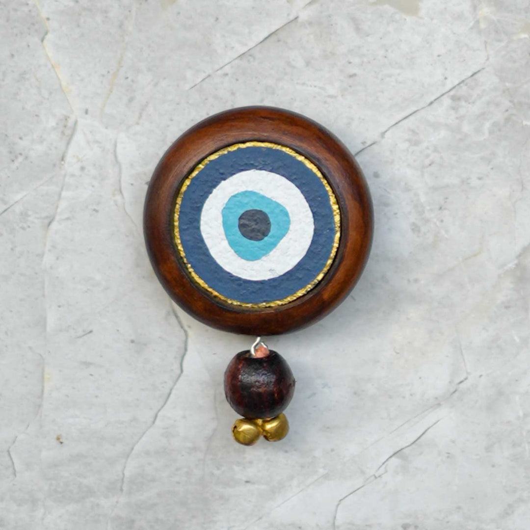 Handmade Nazar Jyoti Gift Hamper | Includes Evil Eye Door Hanging, Evil Eye Bell Hanging, Gold Soy Wax Candles, Seed Card And Outer Box
