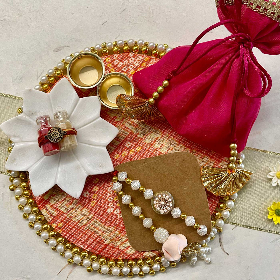 Handmade Sacred Threads Rakhi Hamper Includes 1 Marble Lotus 1 Tilak Bowl 1 Roli Chawal 1 Pooja Thali And 1 Set Bhaiya Bhabhi Rakhi - Pooja thali with accessories