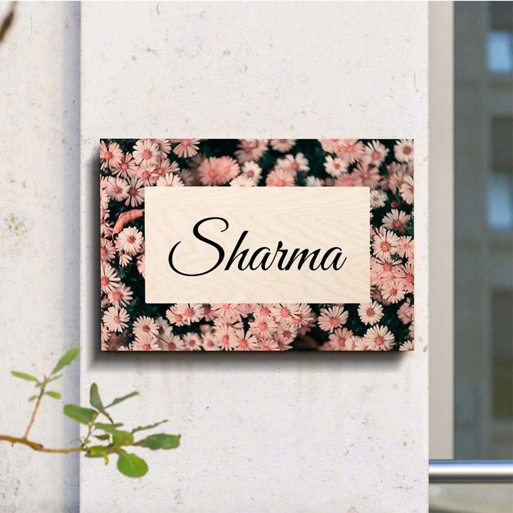 Printed Pink Spring Floral Wooden Rectangle Nameplate For Family - Mounted on Exterior Wall Close-up
