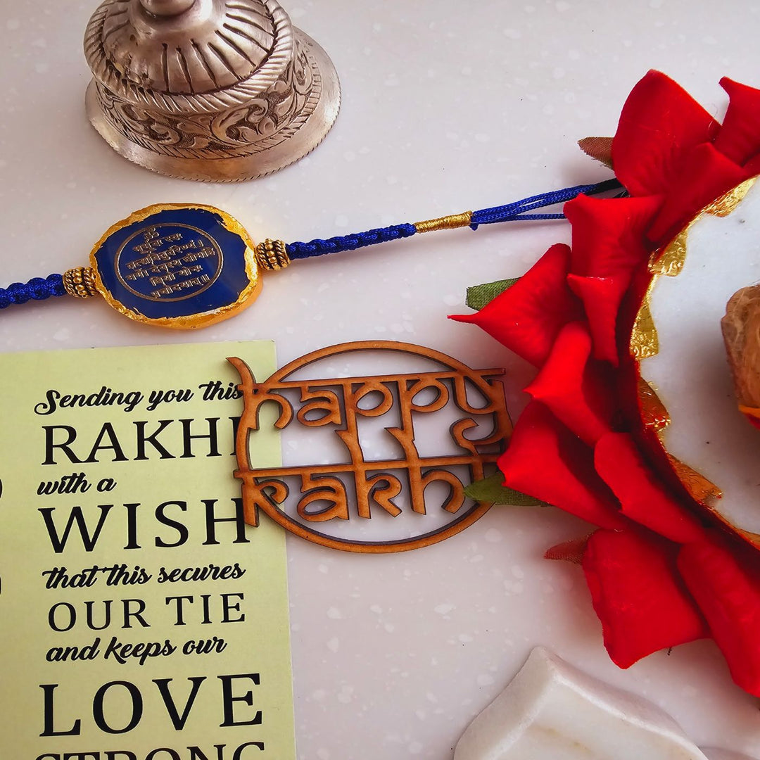 Handmade Gayatri Mantra Agate Rakhi With Roli Chawal For Brother - Close-up of Rakhi and Wish Card