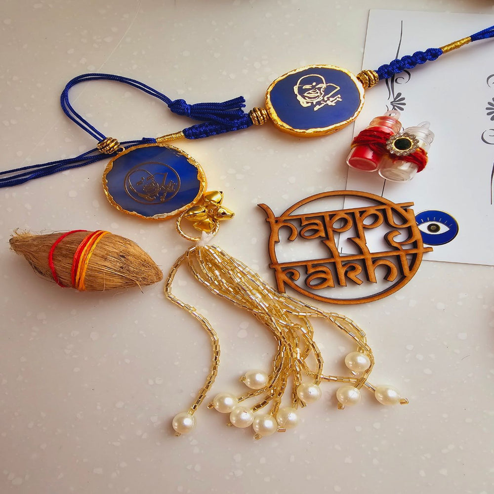 Handmade Shree Sai Baba Agate Bhaiya Bhabhi Rakhi With Roli Chawal - Close-up Flat Lay Display (2)