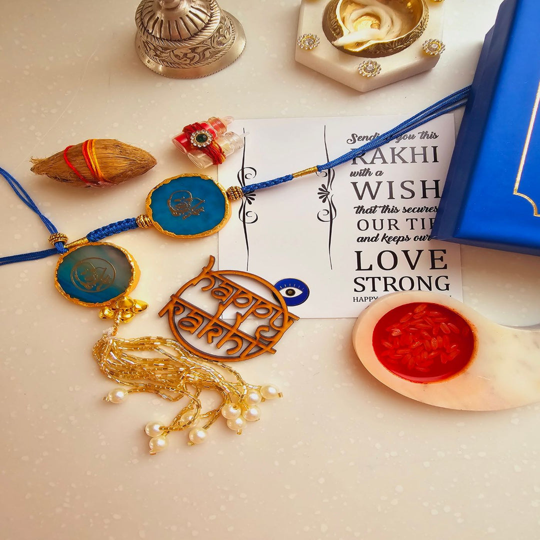 Handmade Shree Sai Baba Agate Bhaiya Bhabhi Rakhi With Roli Chawal - Flat Lay with Poem and Box