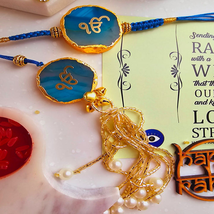Handmade Ik Onkar Agate Bhaiya Bhabhi Rakhi With Roli Chawal - Blue Rakhi Detail Close-up