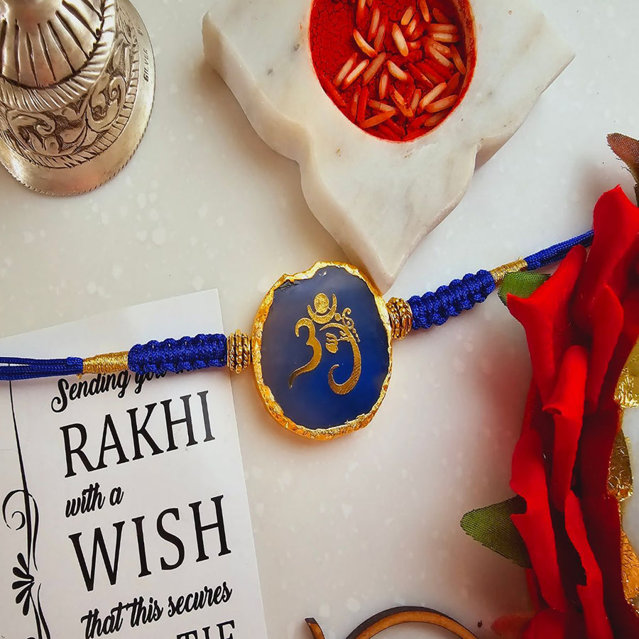 Handmade Om Agate Rakhi With Roli Chawal For Brother - Close-up with Wish Card