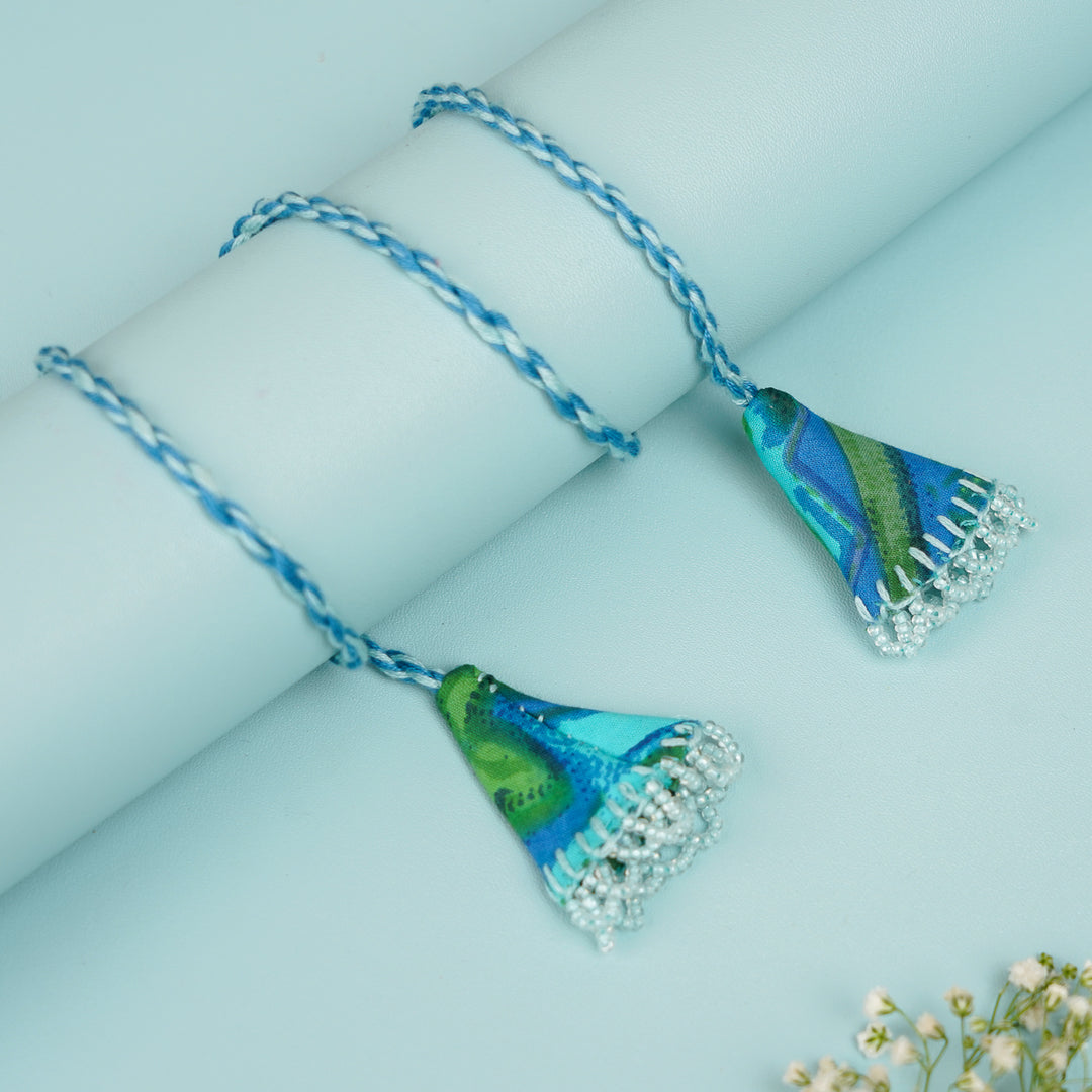 Handmade Reusable Blue Mirror And Jhumki Rakhi For Bhabhi - Close-up on Details