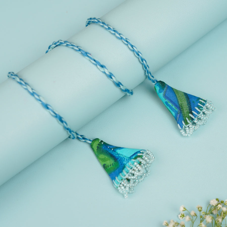 Handmade Reusable Blue Mirror And Jhumki Rakhi For Bhabhi - Close-up on Details