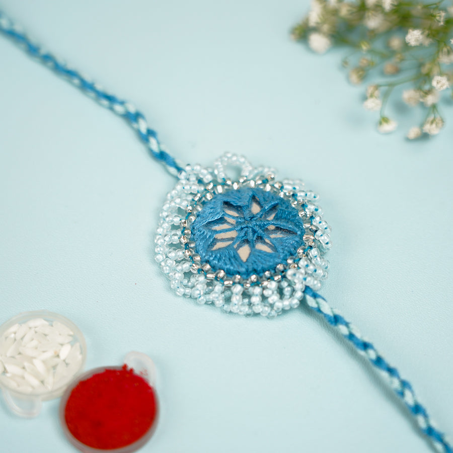 Handmade Reusable Blue Mirror And Jhumki Rakhi For Brother - Close-up of Bracelet Detail
