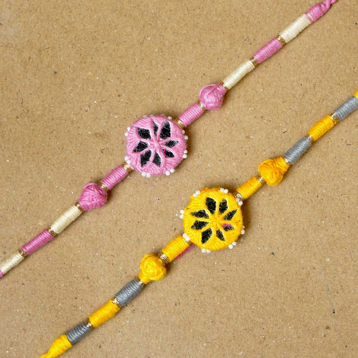 Handmade Mirror Work Patwa Pink-Yellow Cotton Rakhi  With Roli Chawal | Set of 2