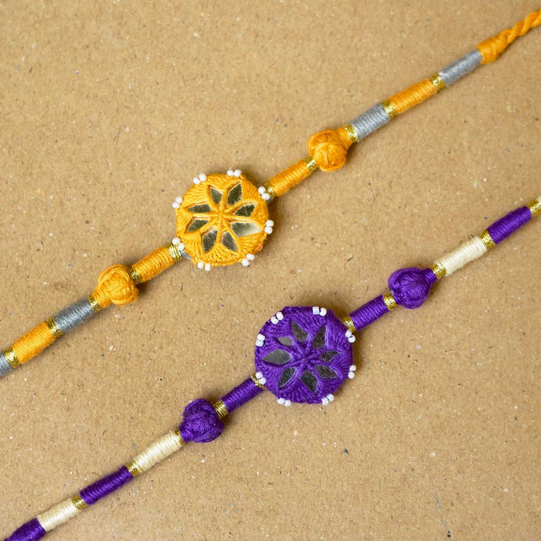 Handmade Mirror Work Patwa Purple-Yellow Cotton Rakhi  With Roli Chawal | Set of 2
