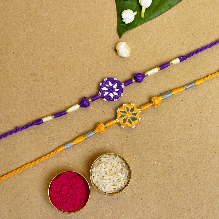 Handmade Mirror Work Patwa Purple-Yellow Cotton Rakhi  With Roli Chawal | Set of 2