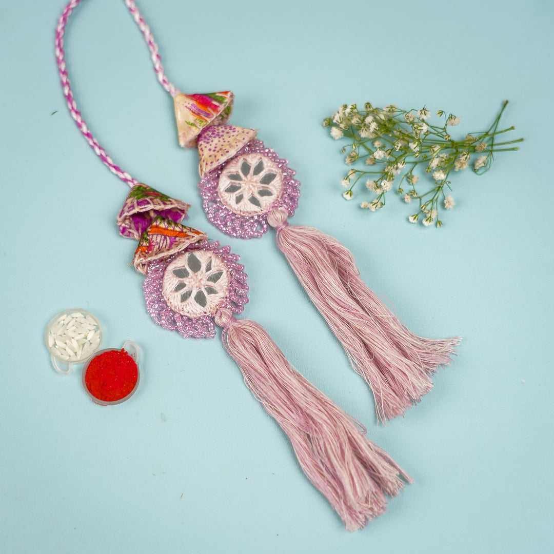 Handmade Reusable Lavender Mirror And Jhumki Rakhi For Bhabhi - Flat Lay Display with Accessories