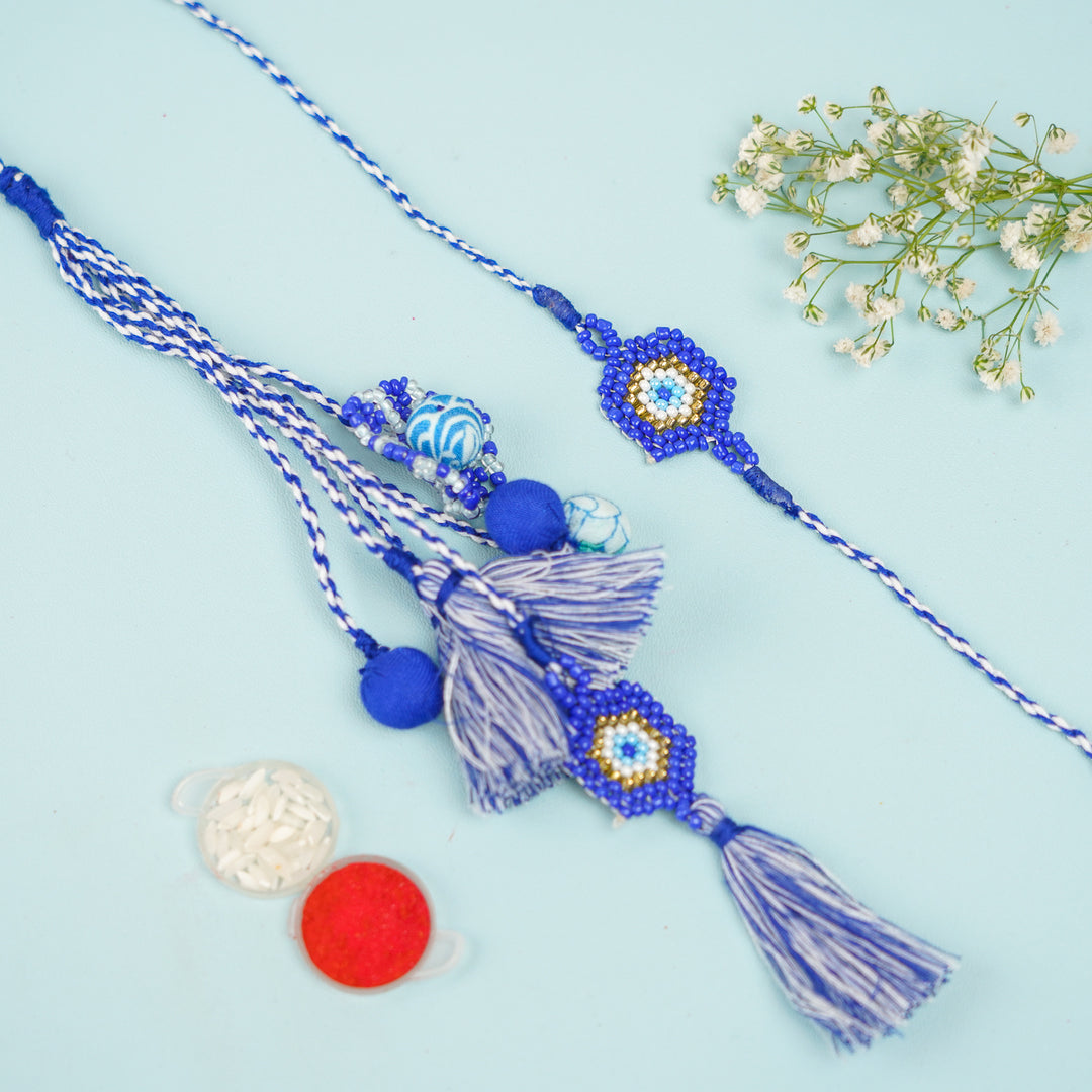 Handmade Reusable Evil Eye Beads And Jhumki Rakhi And Lumba For Bhaiya And Bhabhi - Flat Lay with Accessories