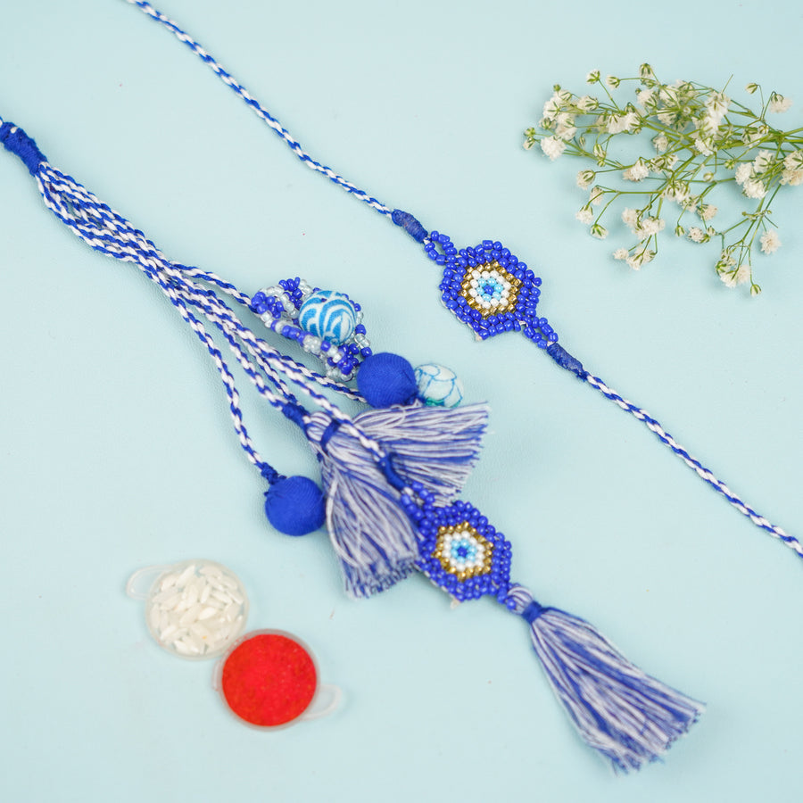 Handmade Reusable Evil Eye Beads And Jhumki Rakhi And Lumba For Bhaiya And Bhabhi - Flat Lay with Accessories
