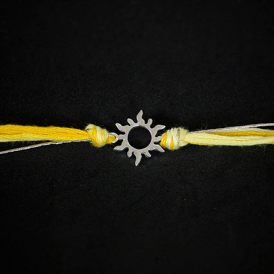 Handmade Arkay 925 Silver Rakhi With Roli Chawal For Brother - Close-up of central charm