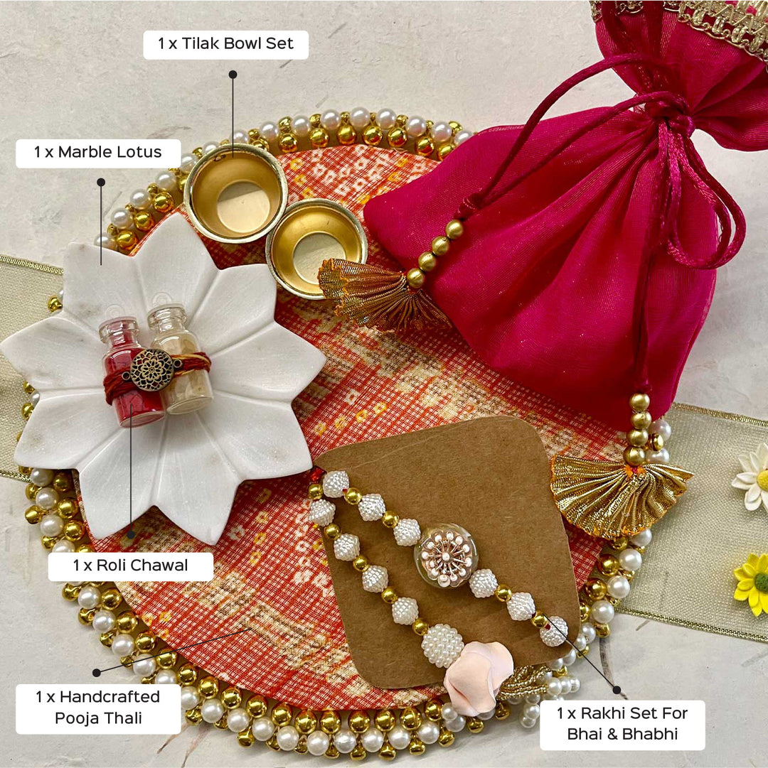 Handmade Sacred Threads Rakhi Hamper Includes 1 Marble Lotus 1 Tilak Bowl 1 Roli Chawal 1 Pooja Thali And 1 Set Bhaiya Bhabhi Rakhi - Labeled product parts