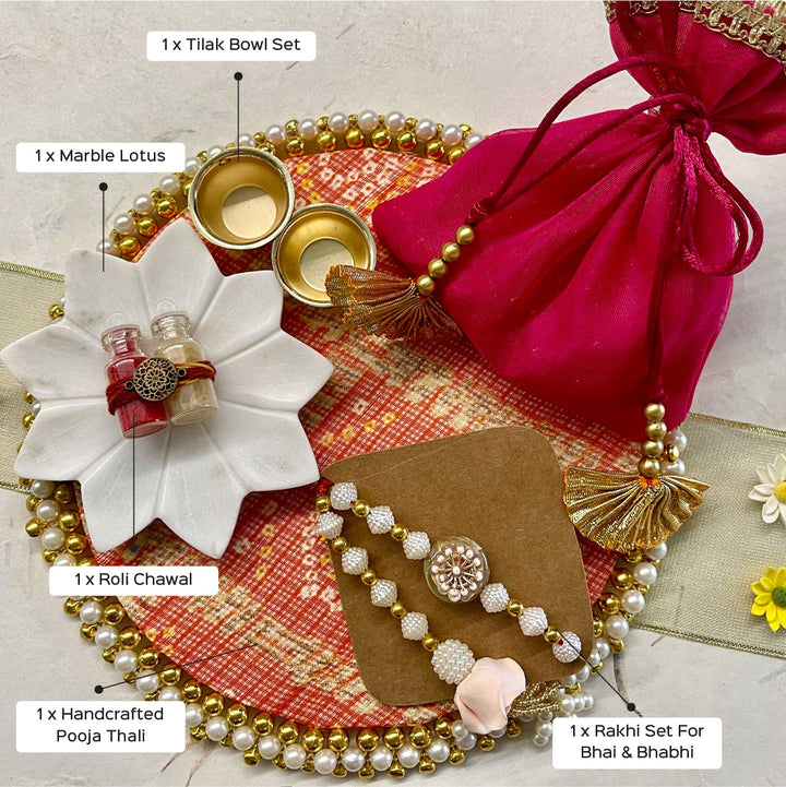 Handmade Sacred Threads Rakhi Hamper Includes 1 Marble Lotus 1 Tilak Bowl 1 Roli Chawal 1 Pooja Thali And 1 Set Bhaiya Bhabhi Rakhi - Labeled product parts