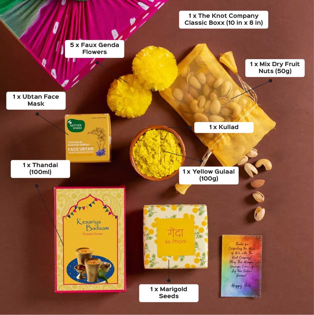Holi Bliss in Yellow Gift Hamper | Includes 5 Faux Genda Flowers, 1 Yellow Gulaal, 1 Thandai, 1 Mix Dry Fruit Nuts, 1 Uptan Face Mask, 1 Kulhad, 1 Marigold Seeds Pack, 1 Classic Gift Box