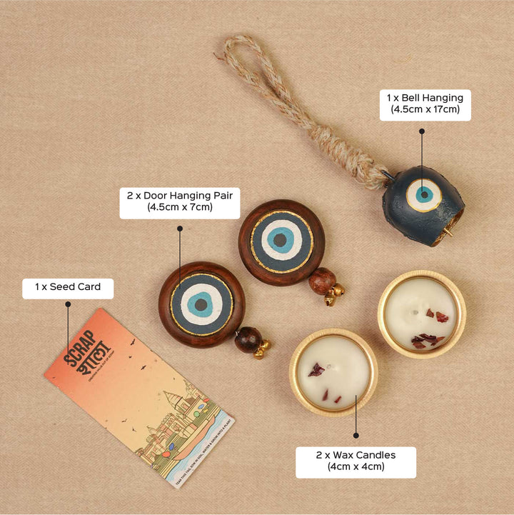 Handmade Nazar Jyoti Gift Hamper | Includes Evil Eye Door Hanging, Evil Eye Bell Hanging, Gold Soy Wax Candles, Seed Card And Outer Box