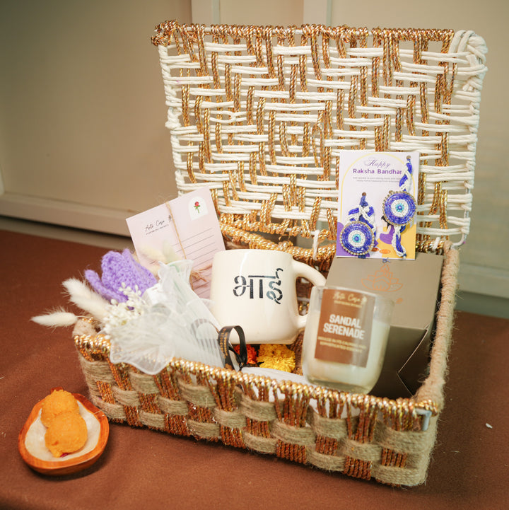 Personalized Handmade Crochet Evil Eye Theme Rakhi Hamper Includes 1 Basket 1 Mug 1 Candle 1 Crochet Flower 2 Rakhis 1 Roli Chawal And 1 Message Card - Gift Basket with Contents Display