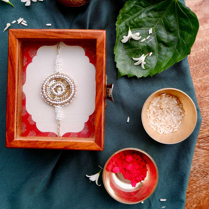 Handmade Zardozi White And Golden Rakhi With Wooden Box And Roli Chawal - In Wooden Gift Box