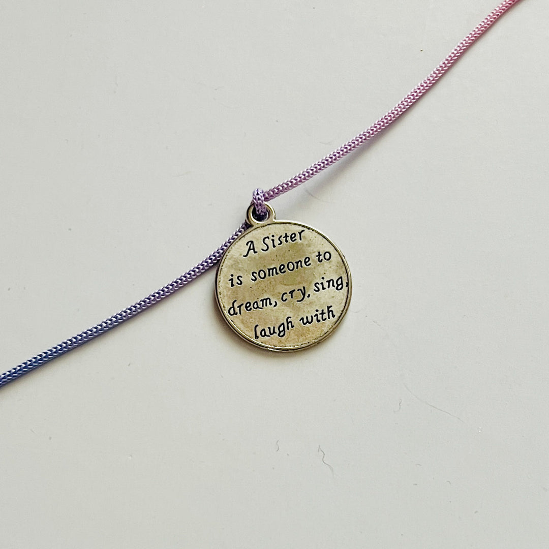Engraved "A Sister Is Someone to Dream Cry Sing Laugh With" Quote Metal Charm Rakhi With Roli Chawal for Brother