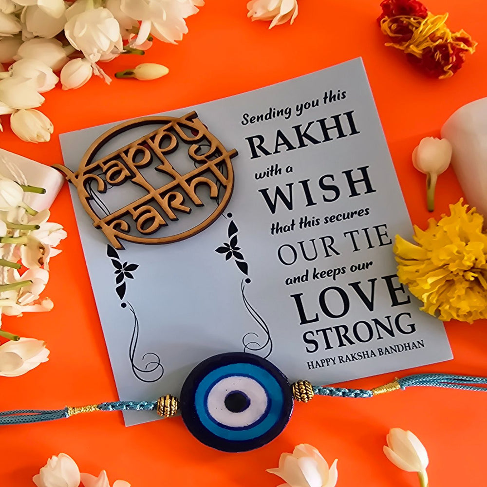 Handmade Blue Pottery Evil Eye Ceramic Rakhi With Roli Chawal For Brother - Rakhi with Greeting Card and Flowers