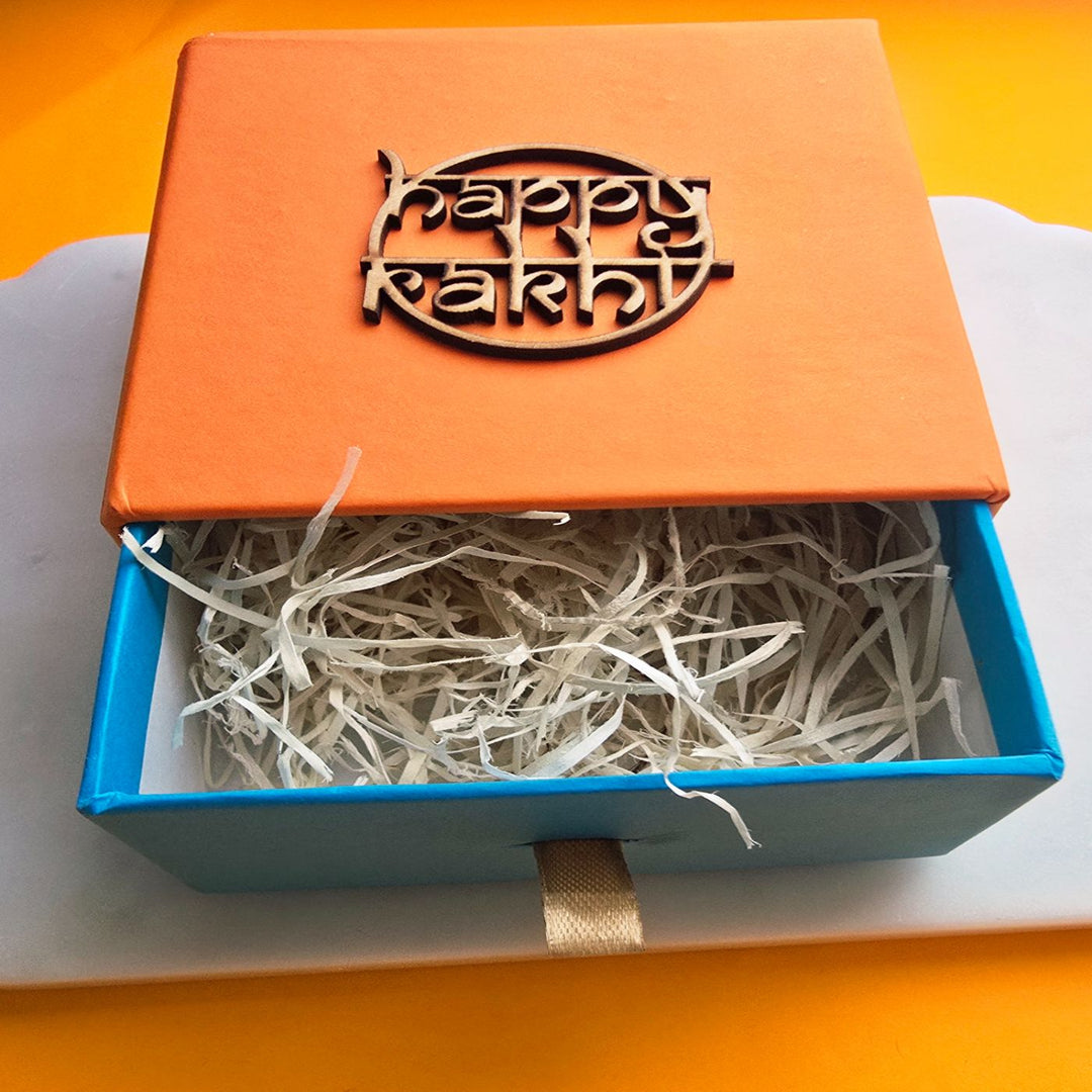 Handmade Blue Evil Eye Ceramic Bhaiya Bhabhi Rakhi With Roli Chawal - Empty Gift Box with Lid Open