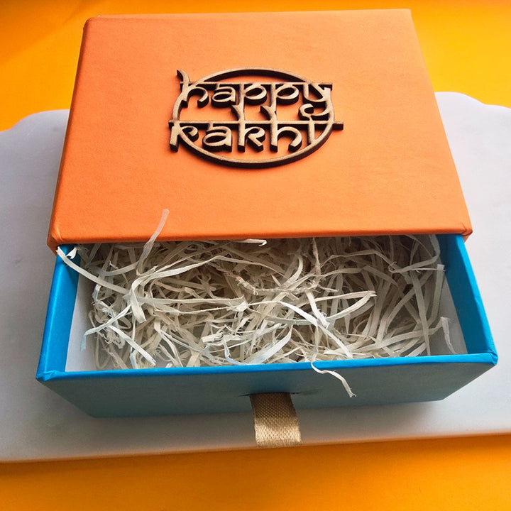 Handmade Blue Evil Eye Ceramic Bhaiya Bhabhi Rakhi With Roli Chawal - Empty Gift Box with Lid Open