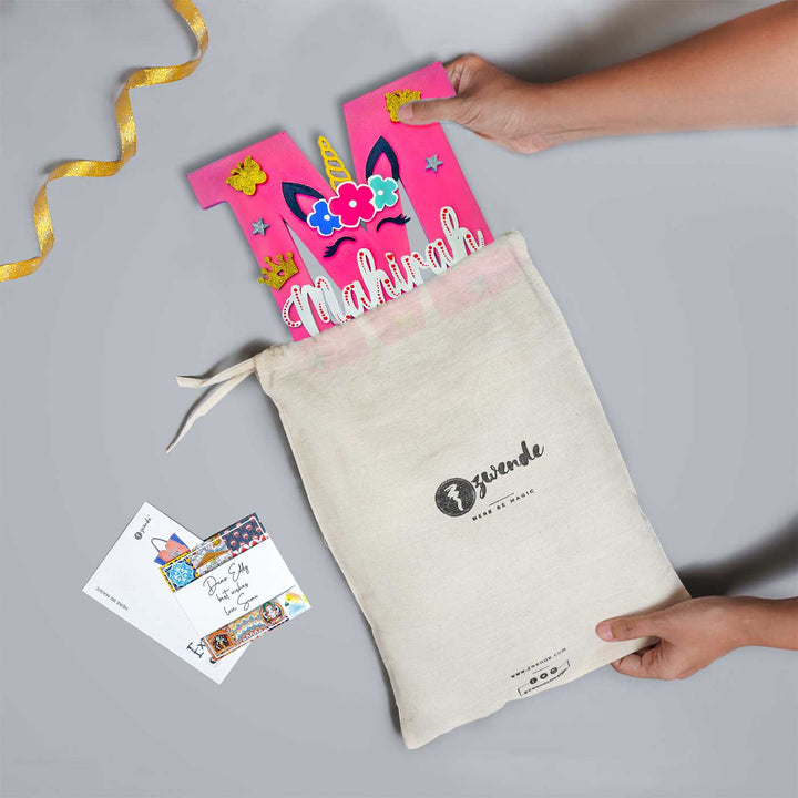 Hand Painted Personalized Siblings Monogram Kids Nameplate 2 - Product Being Removed From Packaging Bag