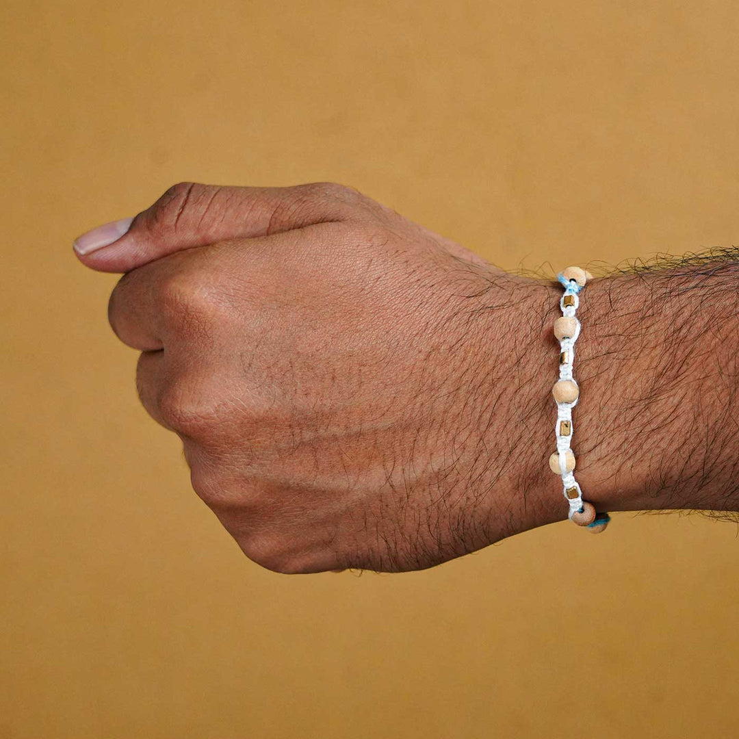 Reusable Beaded Blue Wooden Bead Rakhi With Roli Chawal - Worn on wrist example