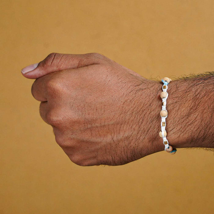 Reusable Beaded Blue Wooden Bead Rakhi With Roli Chawal - Worn on wrist example
