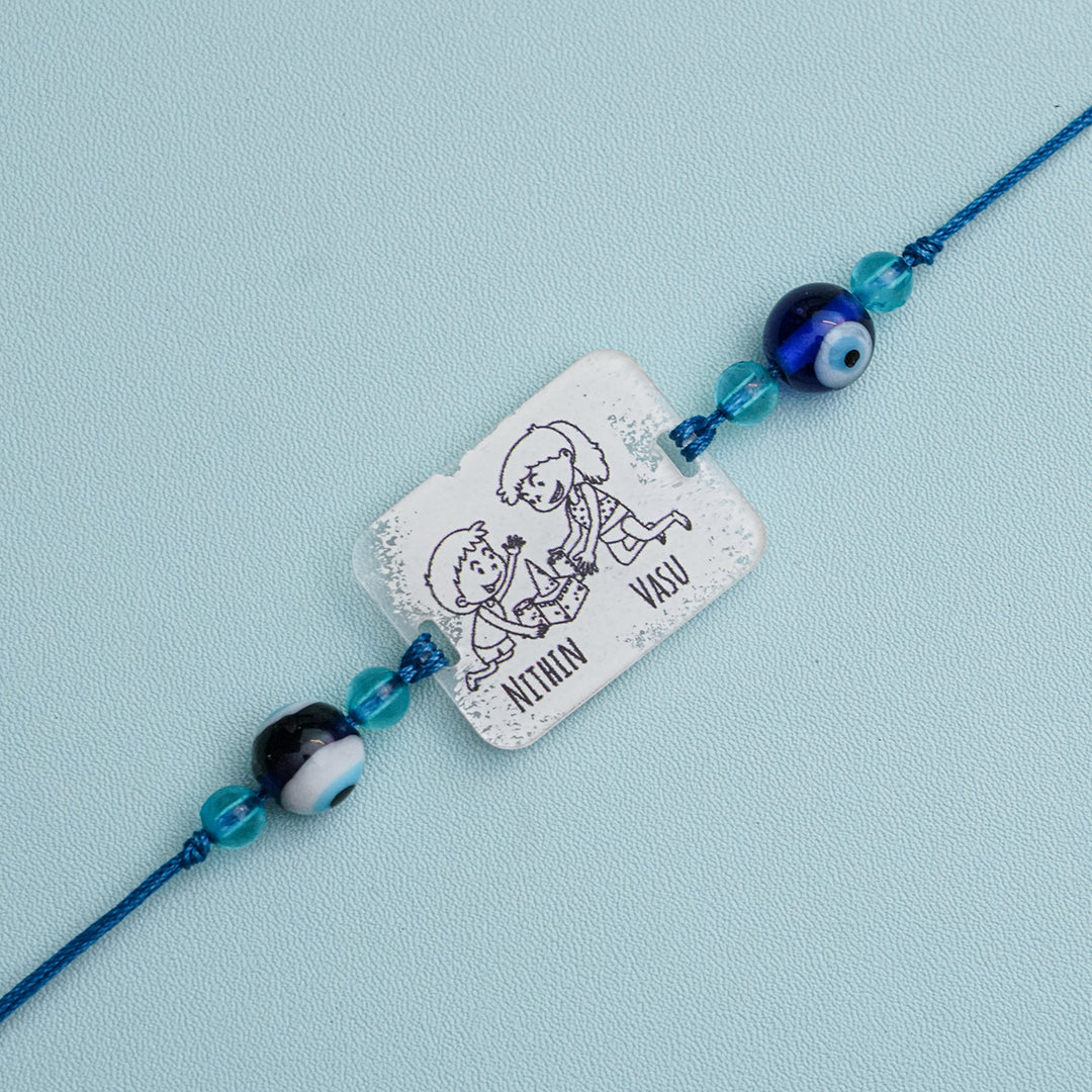 Personalized Handmade 3D Line Art Bro And Sis Evil Eye Beads Acrylic Rakhi With Roli Chawal - Engraving Close-up