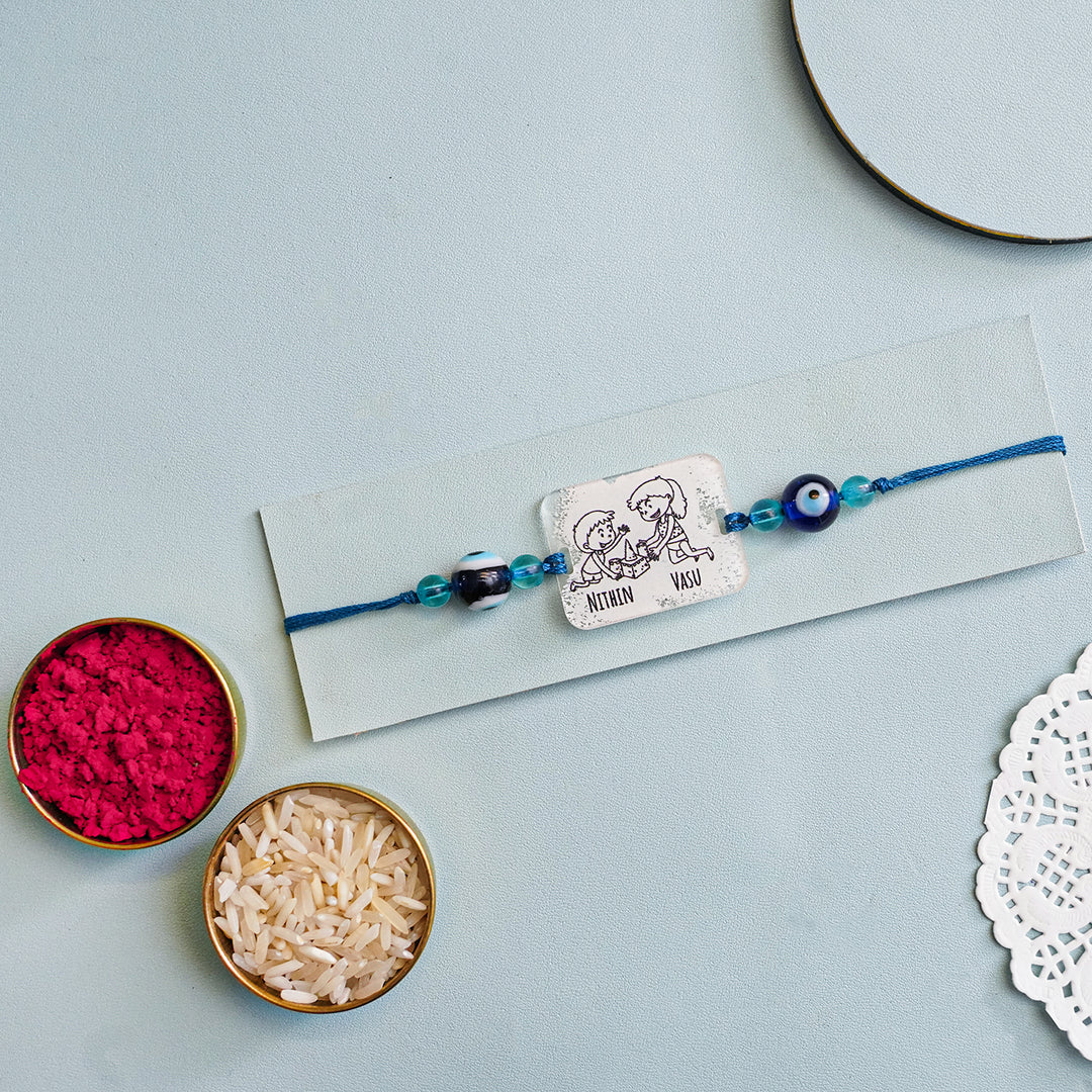 Personalized Handmade 3D Line Art Bro And Sis Evil Eye Beads Acrylic Rakhi With Roli Chawal - Mounted on Card with Accessories
