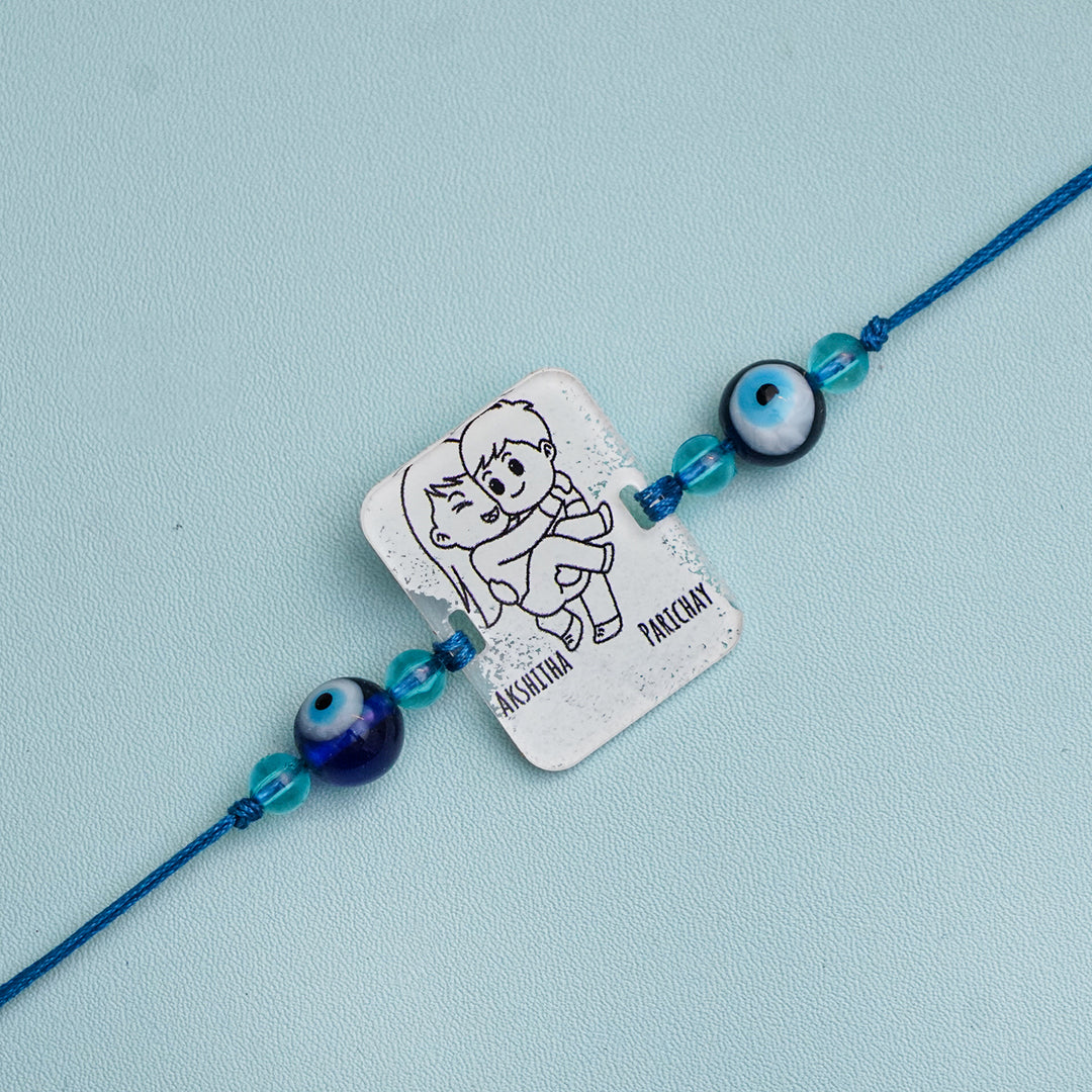 Personalized Handmade 3D Line Art Bro And Sis Evil Eye Beads Acrylic Rakhi With Roli Chawal - Engraving Close-up (3)