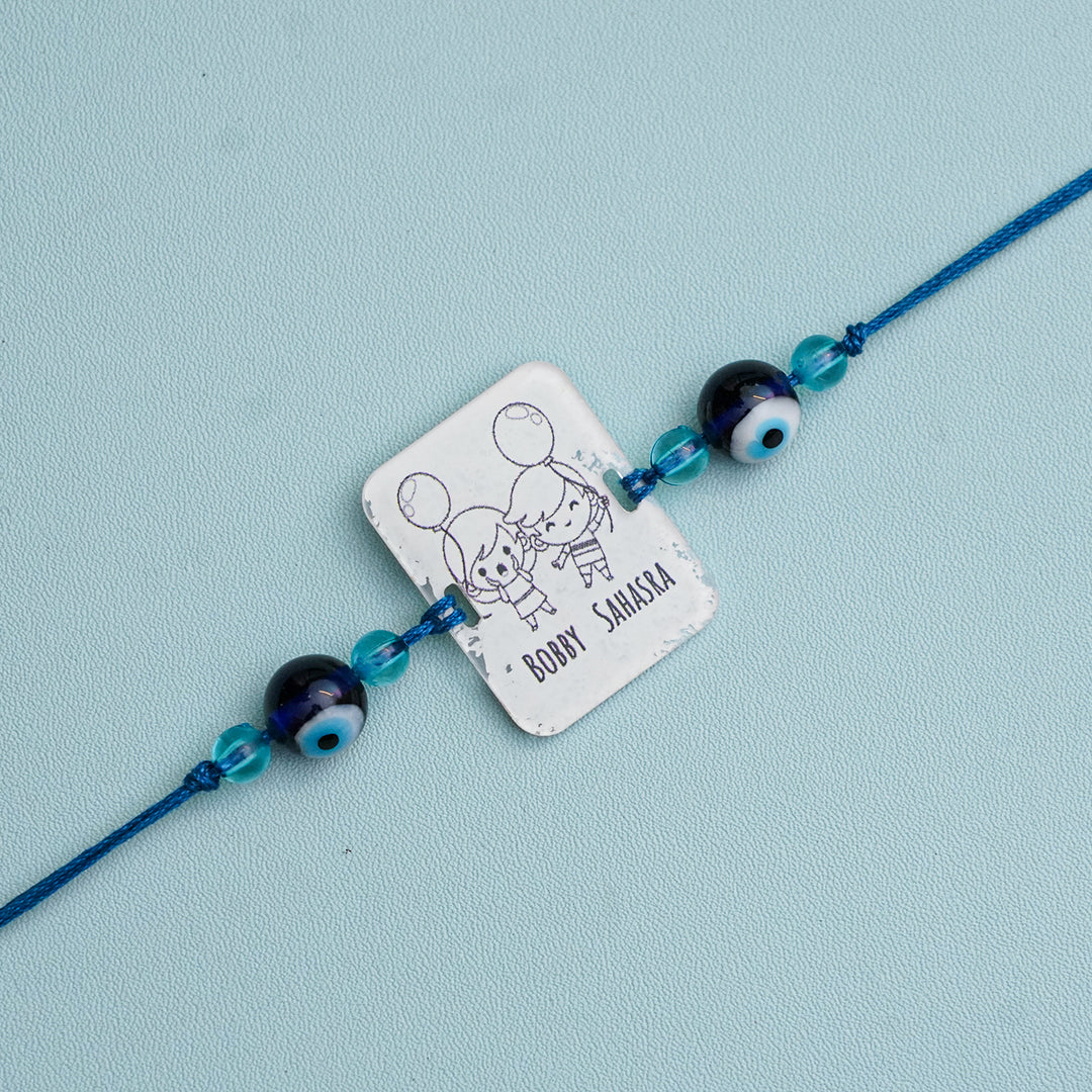 Personalized Handmade 3D Line Art Bro And Sis Evil Eye Beads Acrylic Rakhi With Roli Chawal - Engraving Close-up (9)