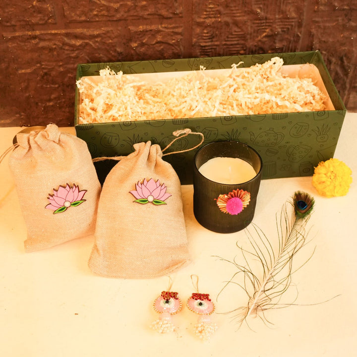 Light & Nourish Diwali Gift Hamper | Includes 2 Dry Fruit Potlis, 2 Hangings, 1 Candle, 1 Mor Pankh, 1 Diwali Card, 1 Gift Box