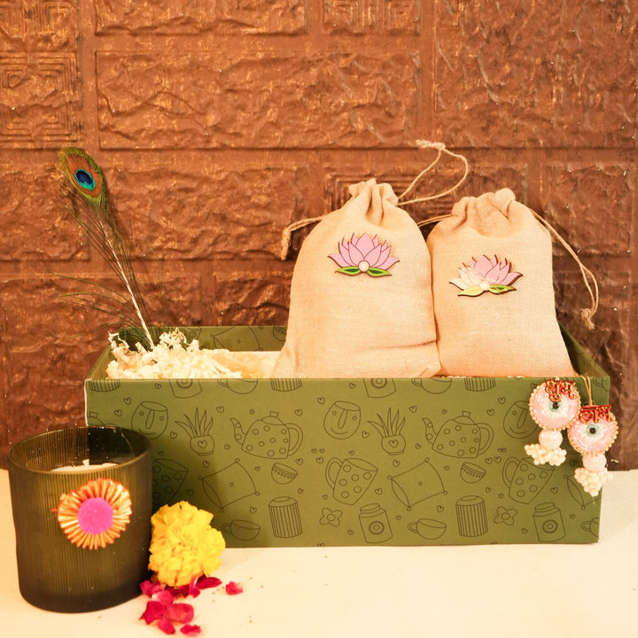 Light & Nourish Diwali Gift Hamper | Includes 2 Dry Fruit Potlis, 2 Hangings, 1 Candle, 1 Mor Pankh, 1 Diwali Card, 1 Gift Box