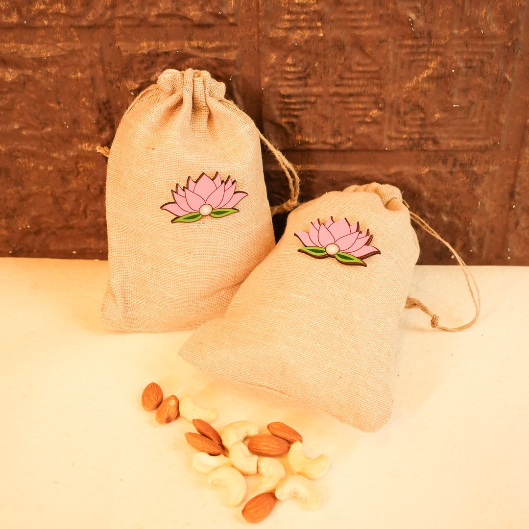 Light & Nourish Diwali Gift Hamper | Includes 2 Dry Fruit Potlis, 2 Hangings, 1 Candle, 1 Mor Pankh, 1 Diwali Card, 1 Gift Box