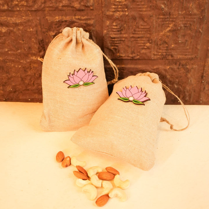 Light & Nourish Diwali Gift Hamper | Includes 2 Dry Fruit Potlis, 2 Hangings, 1 Candle, 1 Mor Pankh, 1 Diwali Card, 1 Gift Box