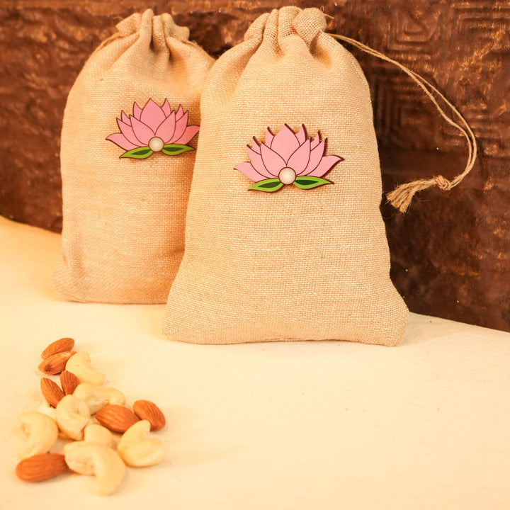 Light & Nourish Diwali Gift Hamper | Includes 2 Dry Fruit Potlis, 2 Hangings, 1 Candle, 1 Mor Pankh, 1 Diwali Card, 1 Gift Box